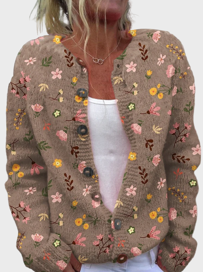Adīta veste ar ziedu rakstu